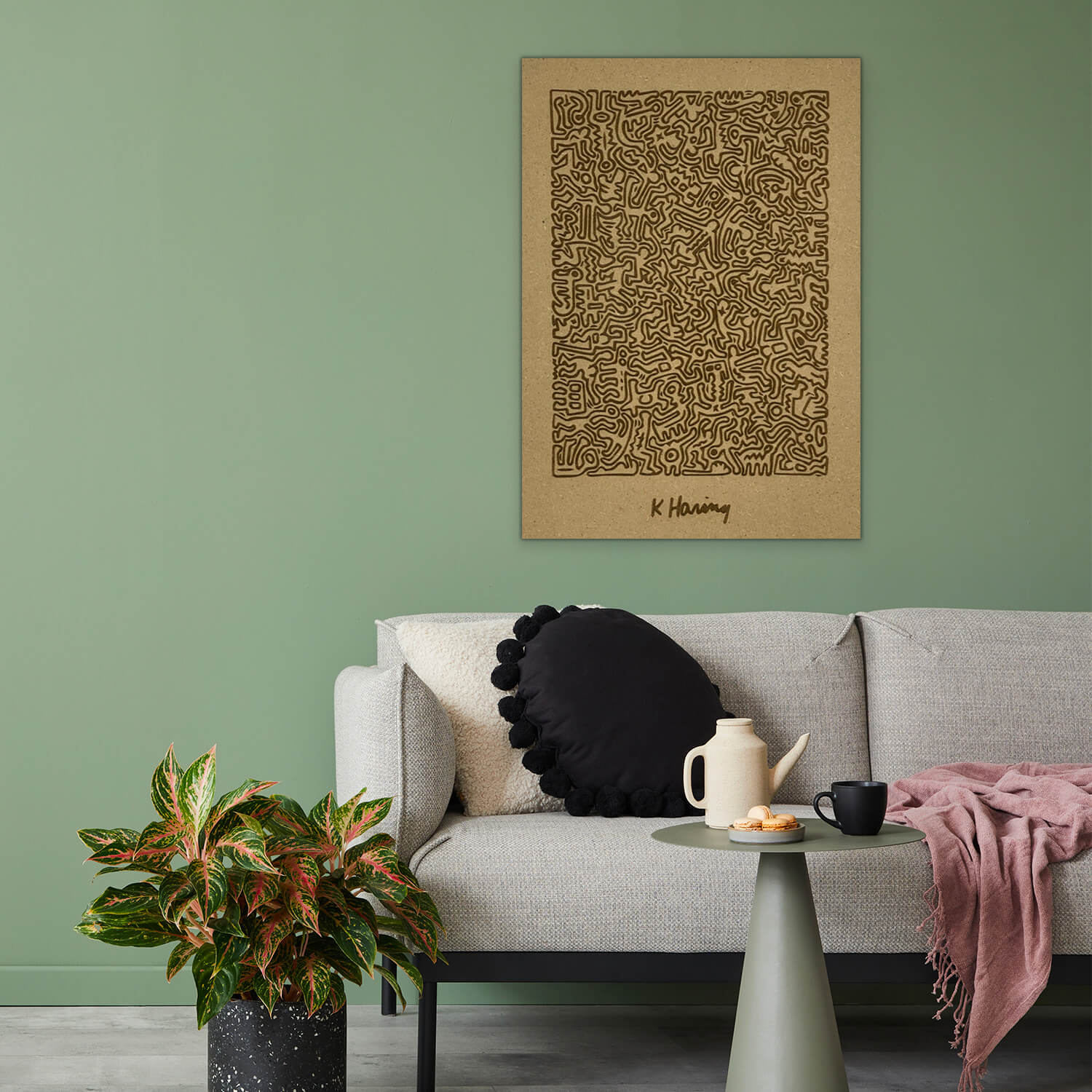 Un poster en bois inspiré du travail de Keith Haring.